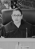 Judge Theodora Komninos